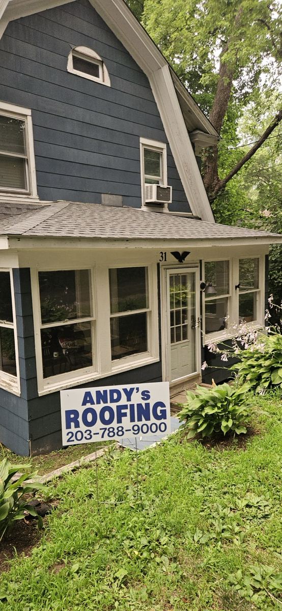 Completed Dutch colonial with yard sign