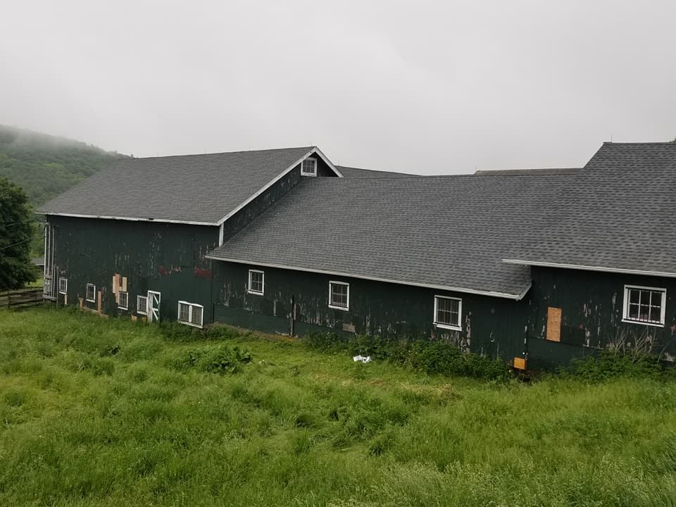 Farm building re-roof in New York